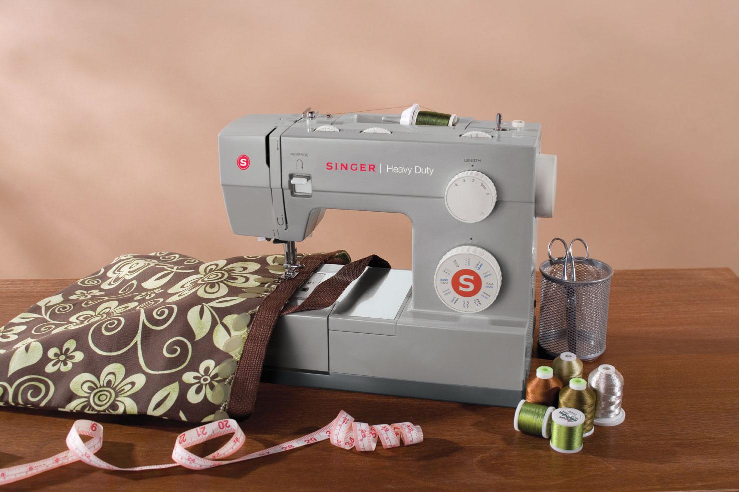 Singer - Heavy Duty sewing machine - household items - by owner